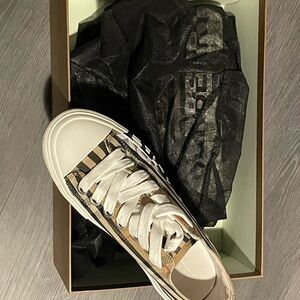 Stylish White and Gold Sneakers